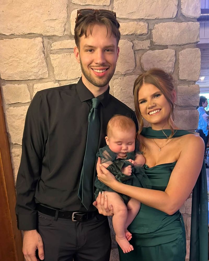 RJ Kelly with his wife, Savannah, and their daughter, Mercy